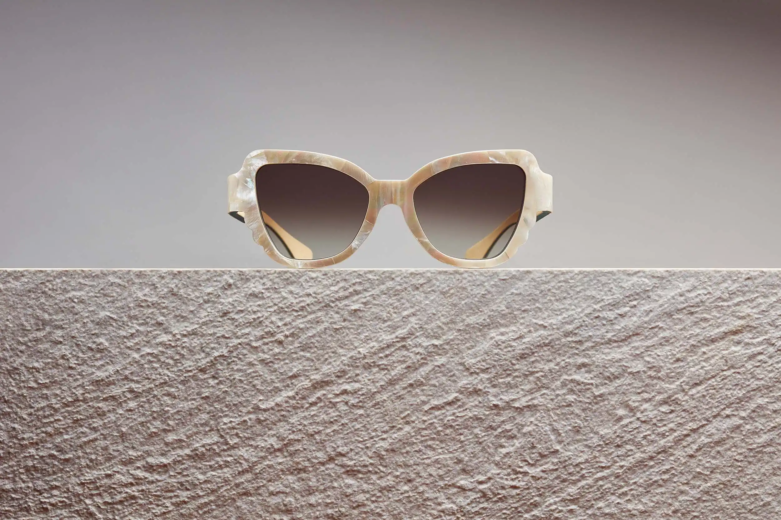 luxury, creating sunglasses that combine innovative design with a touch of natural elegance, making them a desirable choice for fashion-conscious individuals seeking stylish eye protection with a unique and captivating allure.